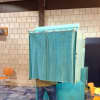 One Tuckahoe resident casts his vote behind the curtain at the Community Center.