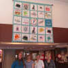 A large team of Rye YMCA quilters created a special quilt in honor of the 25th Rye Derby. Seen here with the quilt are team members Ann Edmonds, Amy Katz, Penny Cozza and Kim Mulcahy