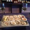 Gemlike bivalves sit on crushed ice as they wait to be happily slurped down by hungry customers at the Northeast Oyster Company in Mamaroneck.