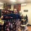 Sven Sujica shows off some of the wares in his new Larchmont store, The Purple Elephants Gift Shop.