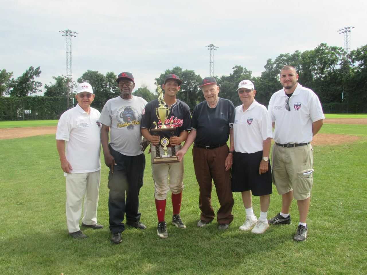 WHTL Tournament Director Al DiLeonardo, New Rochelle Robins Willie Mack, Ed Martinez, Rich Caswell, WHTL President Vin DiLauro and WHTL Operations Manager Chris Woodard at the awards ceremony.