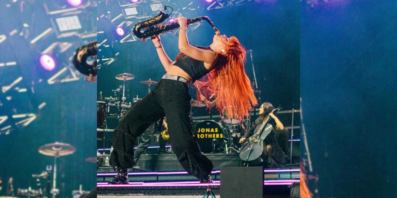 'How Is This My Life?' Saxophonist From NY Burnin' Up Stage On Jonas Brothers World Tour