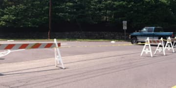A 71-year-old New Canaan Public Works employee was seriously injured after he was struck by a vehicle Wednesday morning.