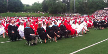 The graduation ceremony begins at Greenwich High School.