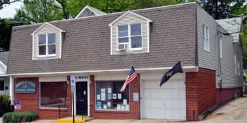 Dumont's zoning officer has been suspended without pay, NorthJersey.com reports.