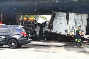 Box Truck Being Towed Tips Beneath Route 80 Overpass