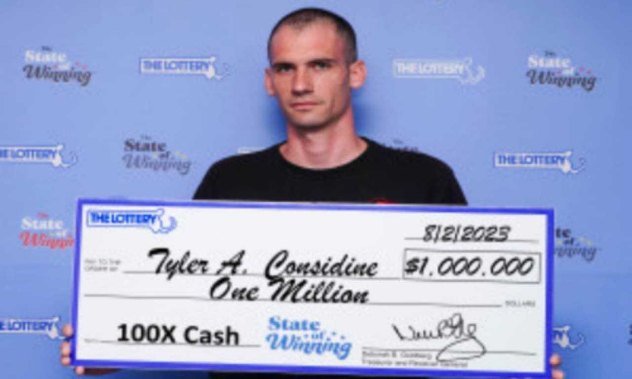 Lottery Winner Returns To Work After Picking Up $1M Check