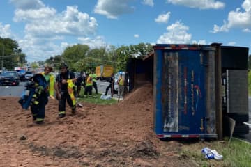 Dump Truck Overturns On Rt. 202, Scattering Dirt And Injuring Driver (UPDATE)