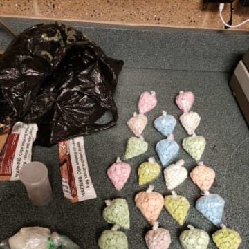 New York State Police troopers arrested a man with a host of drugs after a brief struggle.