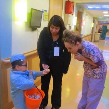 A child trick-or-treats at Sunshine Children's Home and Rehab Center. The home is trying to expand from 54 to 122 beds.