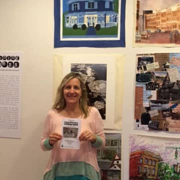 A member of the staff at Red Hook Public Library has her art of the library displayed at the Envisioning Dutchess Exhibition, Barrett Art Center, Poughkeepsie, N.Y.