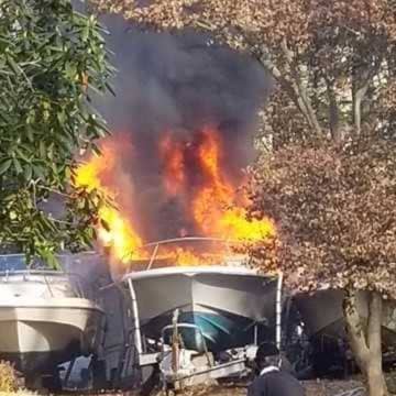 A fire broke out in a boat and trailer, leaving an Airmont home with damage.