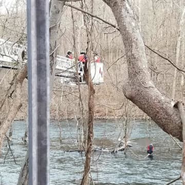 Members of the Croton Fire Department save a man who was stranded in the Croton River.