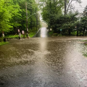 California Road in Eastchester was closed after flooding on Sunday, police said.