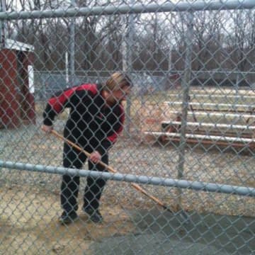 Joe Kleinot works on the Pompton Lakes baseball fields.