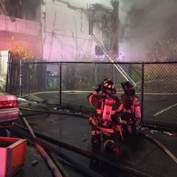 Firefighters were forced to work from outside as flames shot through the Rosa Parks Boulevard home.