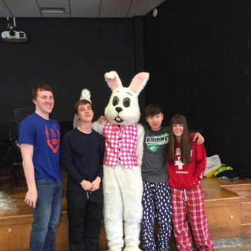 New Milford High School Students meet with the Easter Bunny.