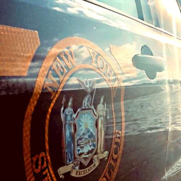 New York State Police report a Queens woman died when she lost control of her vehicle in a heavy rainstorm on the Taconic.