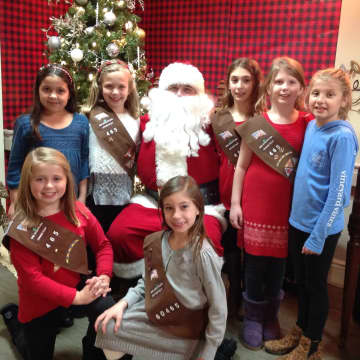 <p>Shelton’s Brownie Girl Scout Troop #60465 visits residents at Bishop Wicke Health and Rehabilitation Center.</p>