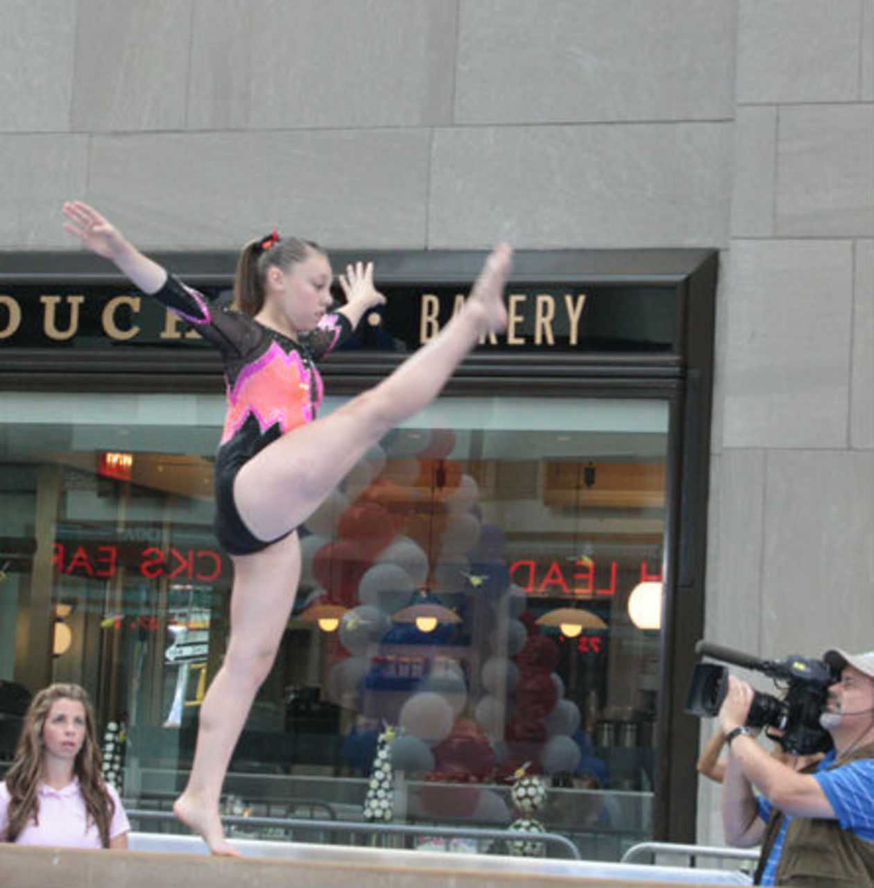 Brittney McNiff performs on the balance beam.