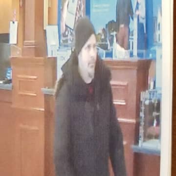 A person of interest caught in a bank robbery that was caught on video surveillance is being questioned by Clarkstown Police.