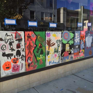 Halloween paintings by local children grace the windows of local businesses throughout Rye. These paintings appeared on the window of the John Christopher Salon.