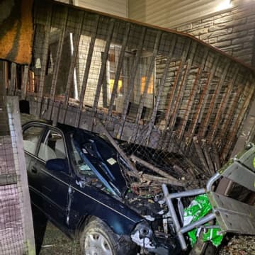 A driver allegedly lost control of his vehicle and crashed into the porch of a home.