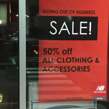 New Balance Bethel posted a sign that indicates the store is going out of business. A new store that sells athletic footwear and apparel is expected to fill the space.