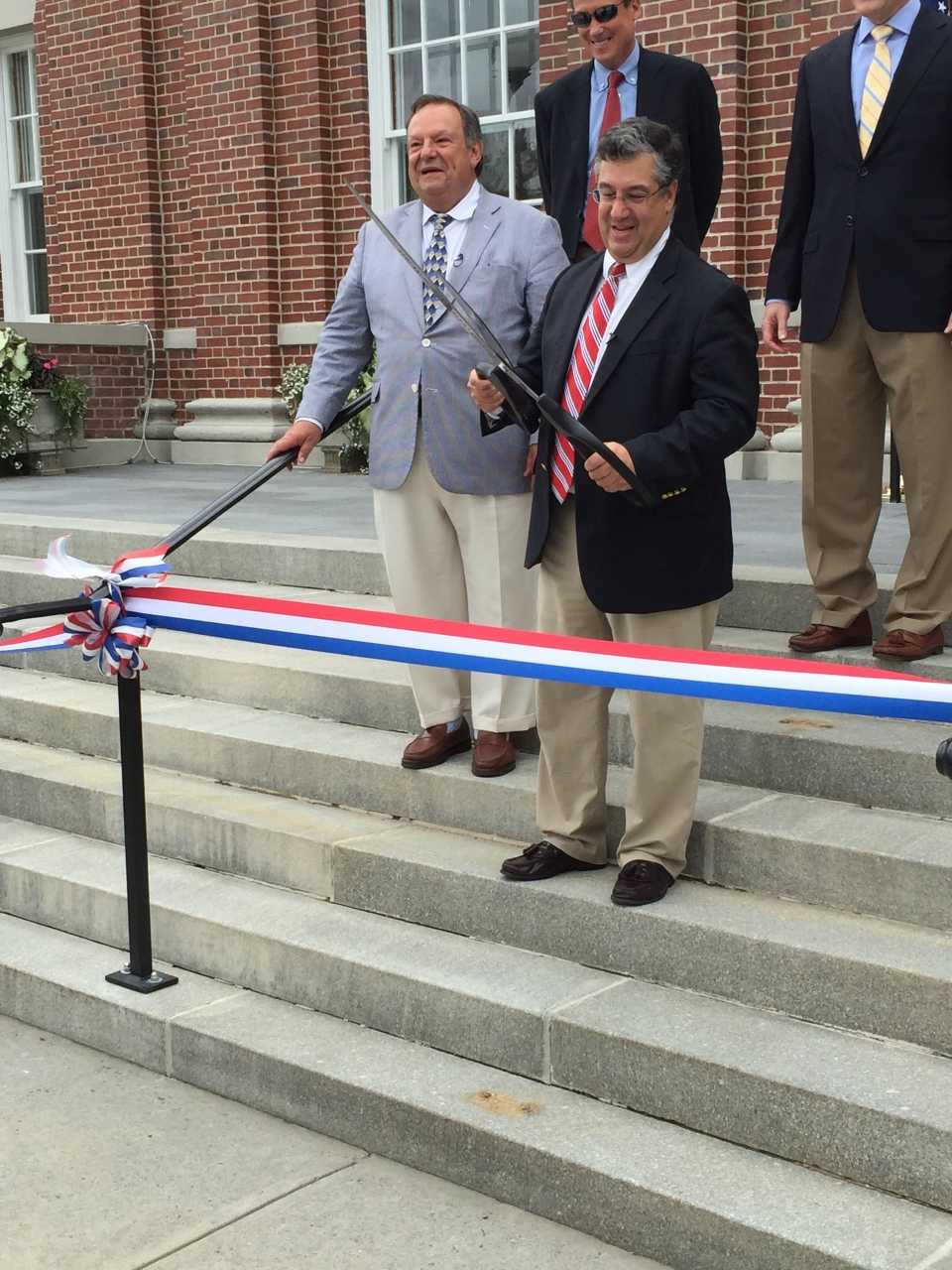 Third Building Committee Chairman Michael T. Averginos and First Selectman Robert E. Mallozzi cut the ribbon on the renovated Town Hall in New Canaan on Saturday. 