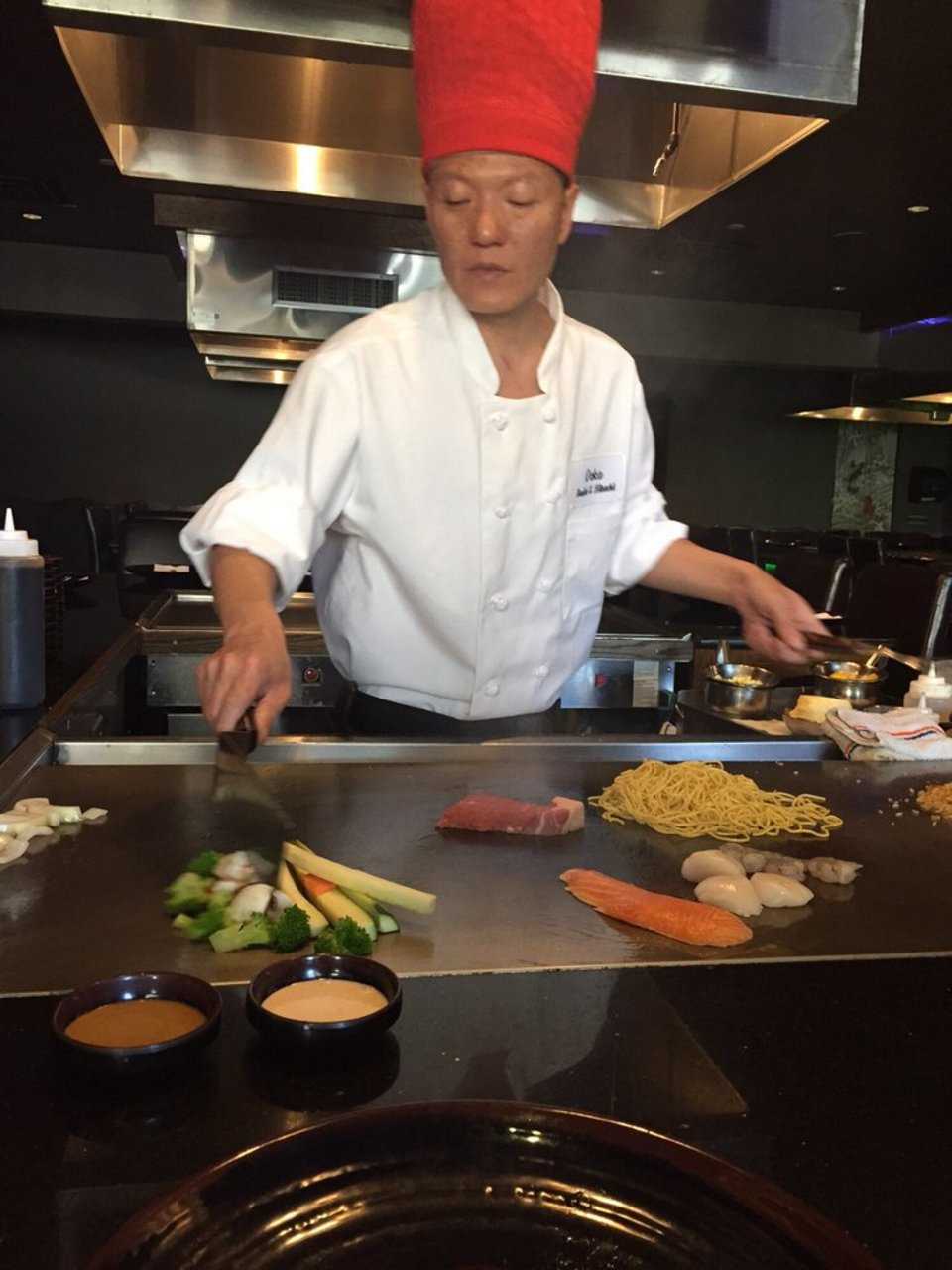 Ooka Sushi & Hibachi Lounge's master chef cooks fresh vegetables and other goodies on the grill at the Clifton restaurant.