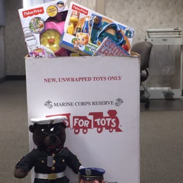 Toys for Tots spokestoys U.S. Marine Bear and Carl the Cookie Jar Cop are reminding folks that there's still plenty of time to donate. Collection boxes are available at the Birdsall-Fagan Police and Court Facility on Spring Street in Ossining.