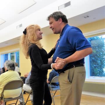 Robin and George Latimer dancing together on Labor Day weekend at the Damiano Recreation Center in Rye.