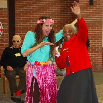 A Waveny Life Care Network Adult Day Program member gets her groove on. 