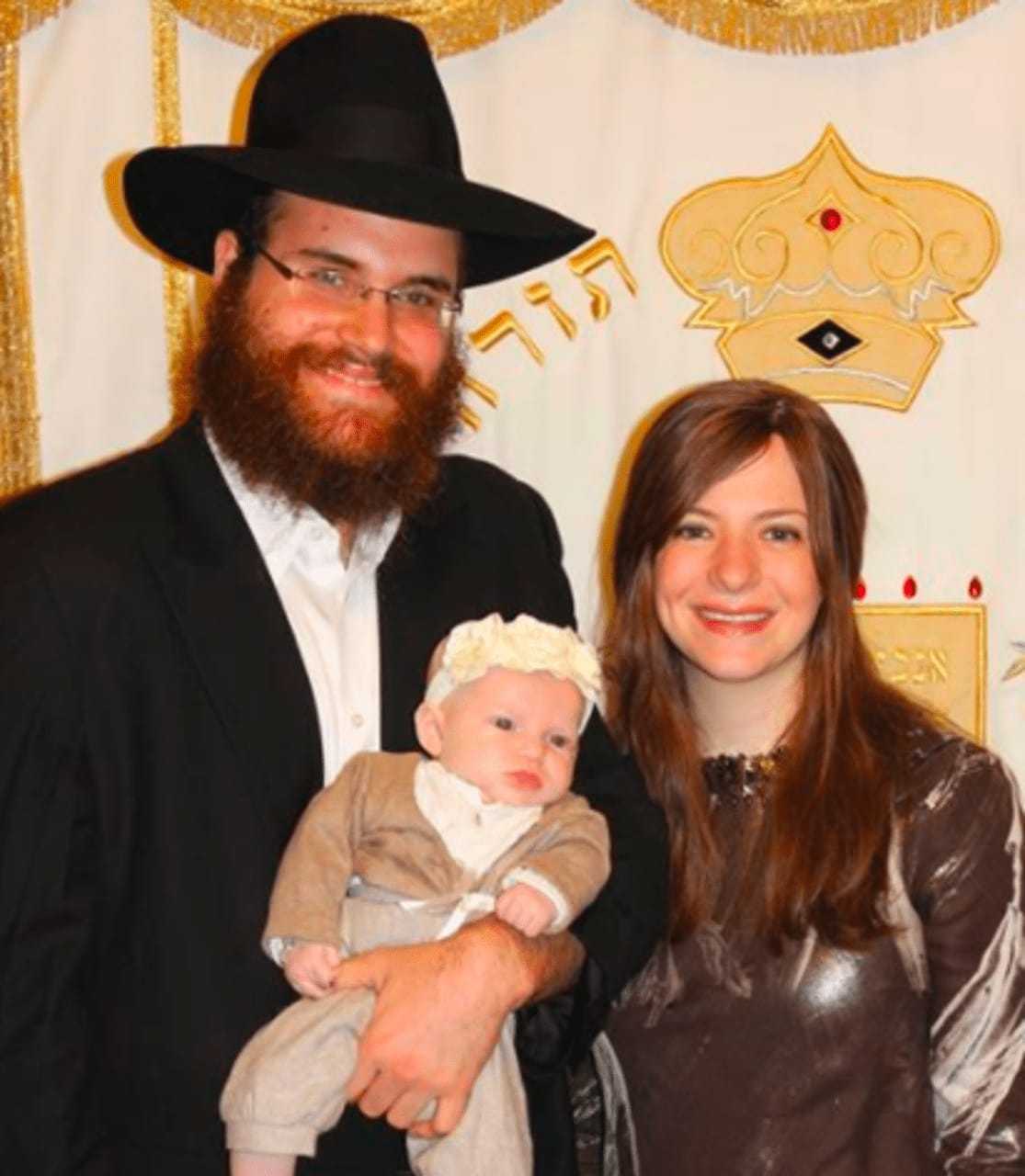 Rabbi Yosef Orenstein with his wife, Estie, and their child, of Valley Chabad in Woodcliff Lake.