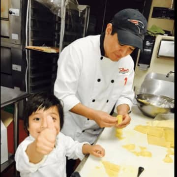 Julliano's Authentic Italian Cuisine in Bethel will celebrate its one year anniversary on Sunday.  From left, Julliano Cevallos, 4, and his father, owner Julio Cevallos
