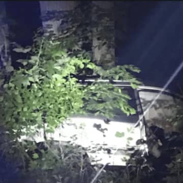 This vehicle went off the Merritt Parkway and into the woods in an overnight crash in Greenwich.