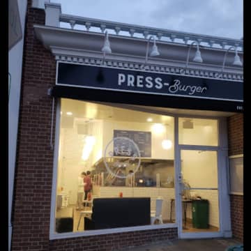 A man was arrested after causing a disturbance at Press Burger.