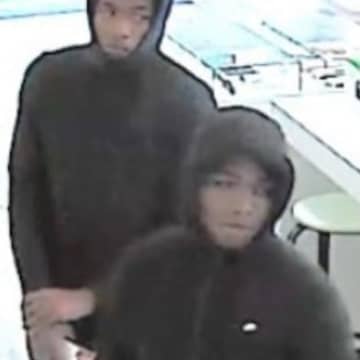 Police in New Rochelle are attempting to track down suspects who stole cellphones on Main Street.
