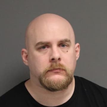 Joseph Mullikin was arrested for allegedly assaulting an infant.
