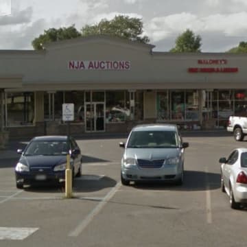 NJA Auctions was closed by city officials for being open in violation of state order.