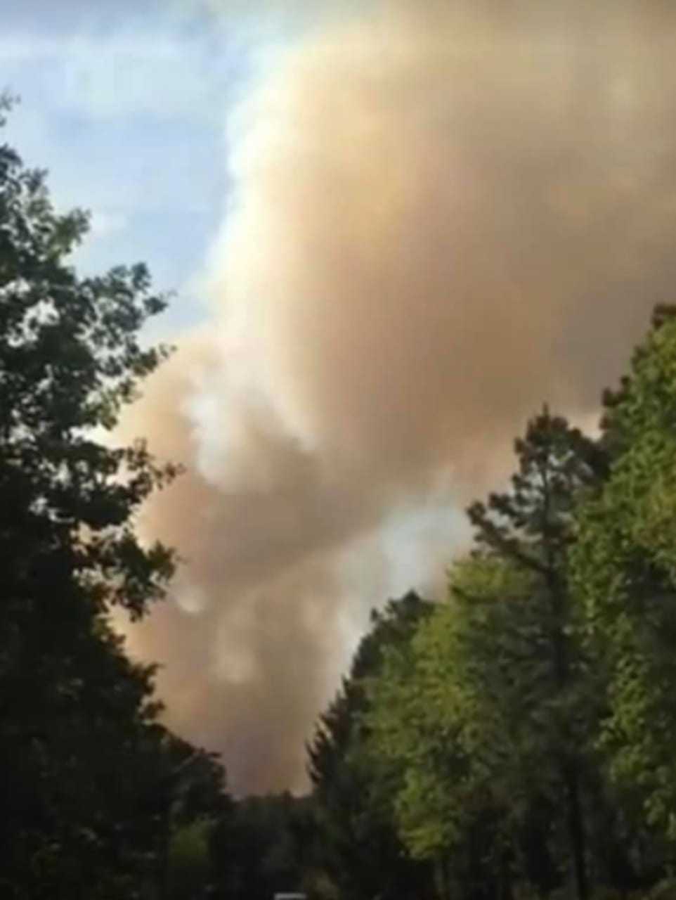 A brush fire consumed nearly 100 acres in the Whiting section of Manchester. This view is from Harry Wright Boulevard.