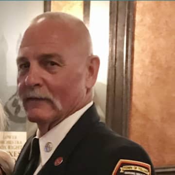 Long-time Tolland Fire Captain Dennis Carlson has died, the Tolland Fire Department announced.