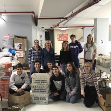 Rye Neck High School students donated food items to the Larchmont-Mamaroneck Food Pantry to assist local families in need.