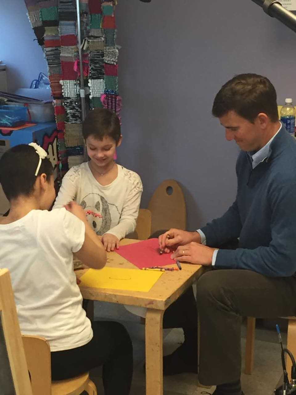 Photos: Eli Manning raises money for Tackle Kids Cancer