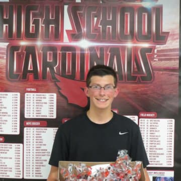 Westwood High School freshman Billy Cook signed his 7,000th baseball with his team.