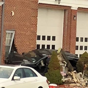 A car crashed into a building in Greenwich on Wednesday morning
