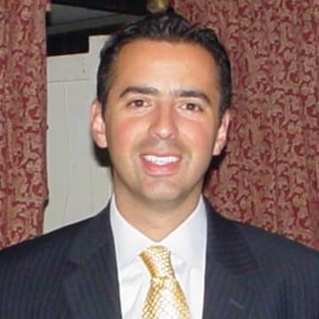 Ossining Superintendent Raymond Sanchez, above, sent a letter to residents in the district informing them of the resignation of former math teacher John Azabache.