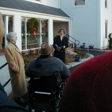 Rev. Nadine Hundetrmark dedicates ADA compliant entrance to the white church in South Salem in December 1999. 