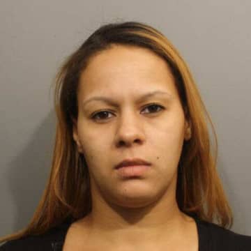 Stamford resident Elsie Alvarez is accused of stealing from Ancona's Wine & Liquor in Wilton.