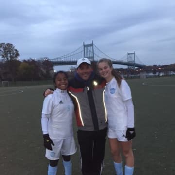 Isabelle Tola (left) and Bridget Richer (right) celebrating their victory in Randalls Island, 6-0, which locked the team in the second round in the N.Y. Cup Tournament.